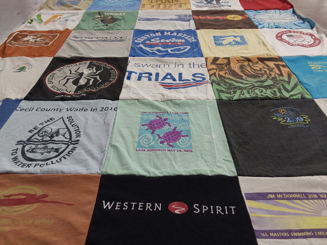 T-shirt quilt with swimming, water themes by John from WA