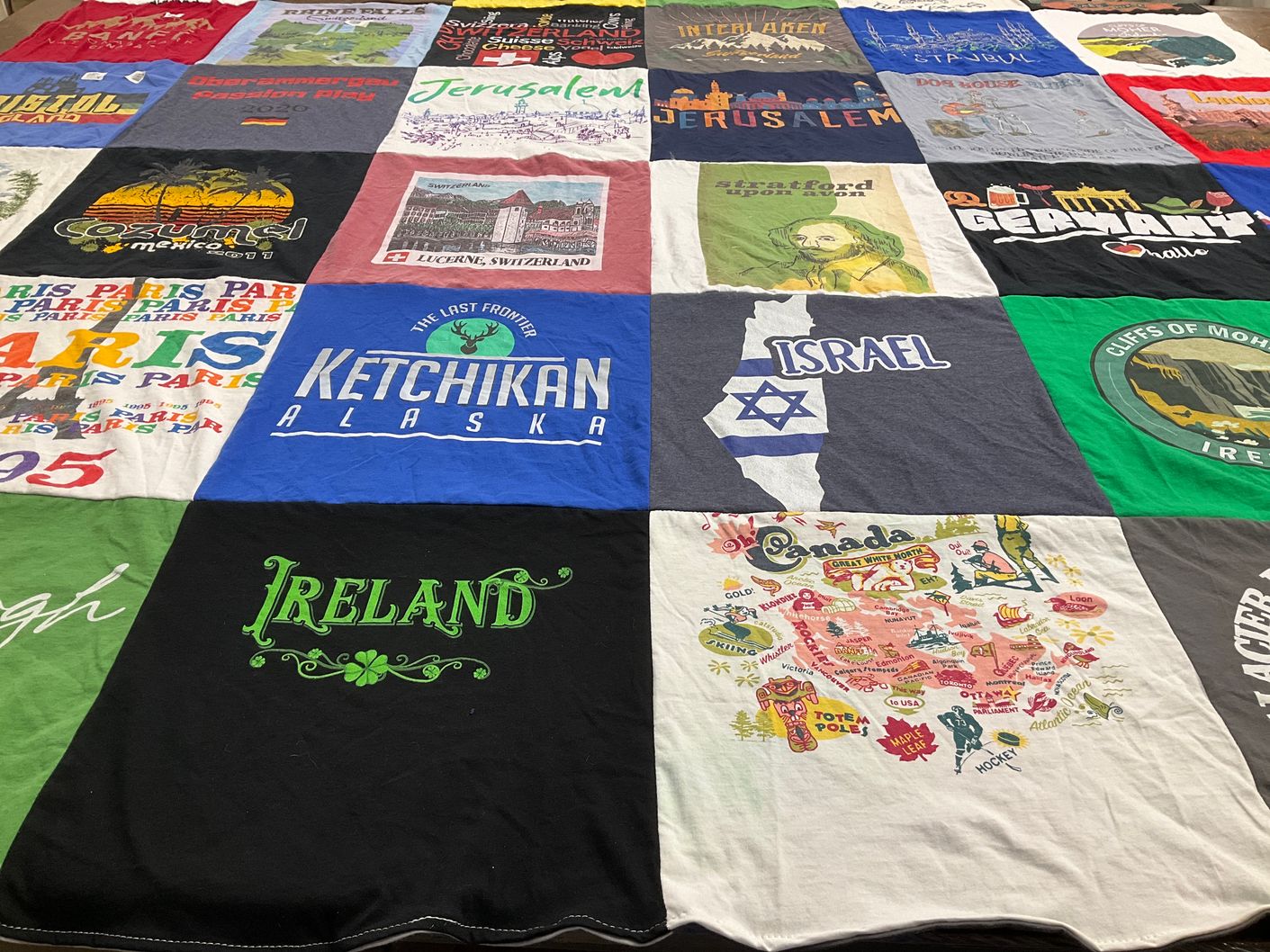 T-shirt quilt with travel, culture themes by Rebecca from MS