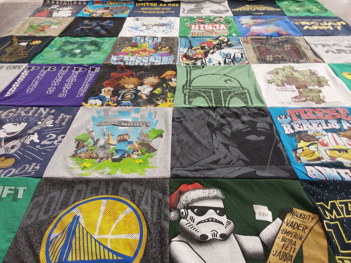 T-shirt quilt with video games, comics themes by Karin from CA