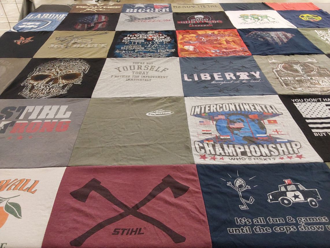 T-shirt quilt with sports, humor themes by Dawn from TX