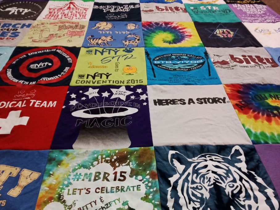 T-shirt quilt with youth organizations, summer camp themes by Lisa from FL
