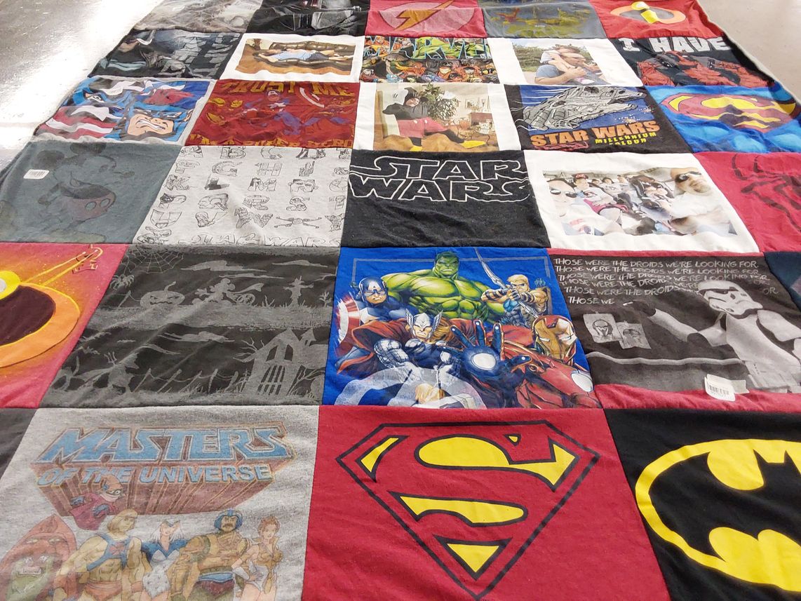 T-shirt quilt with comics, movies themes by ADRIANA from TX
