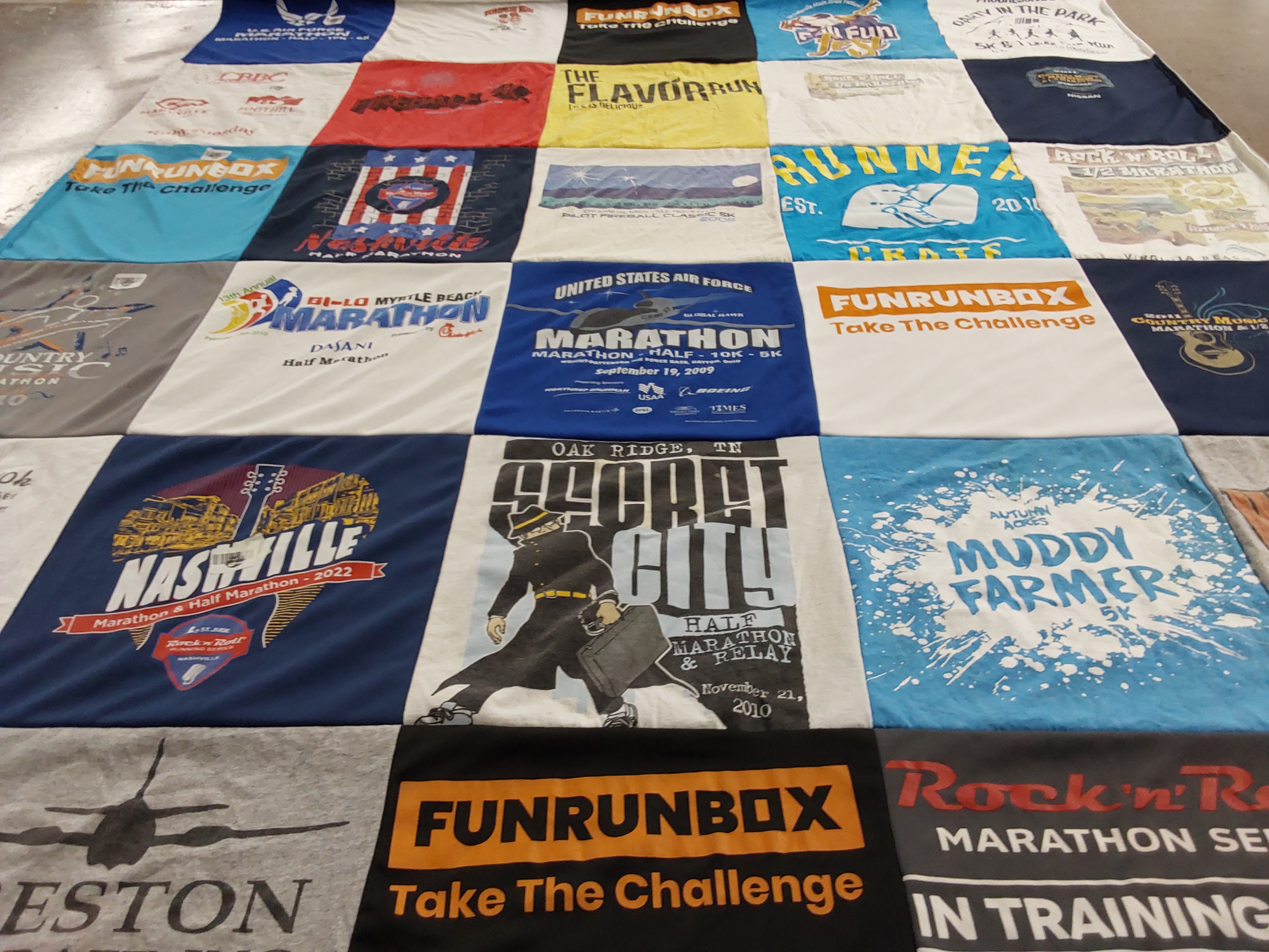 T-shirt quilt with running, fitness themes by Wendy from TN