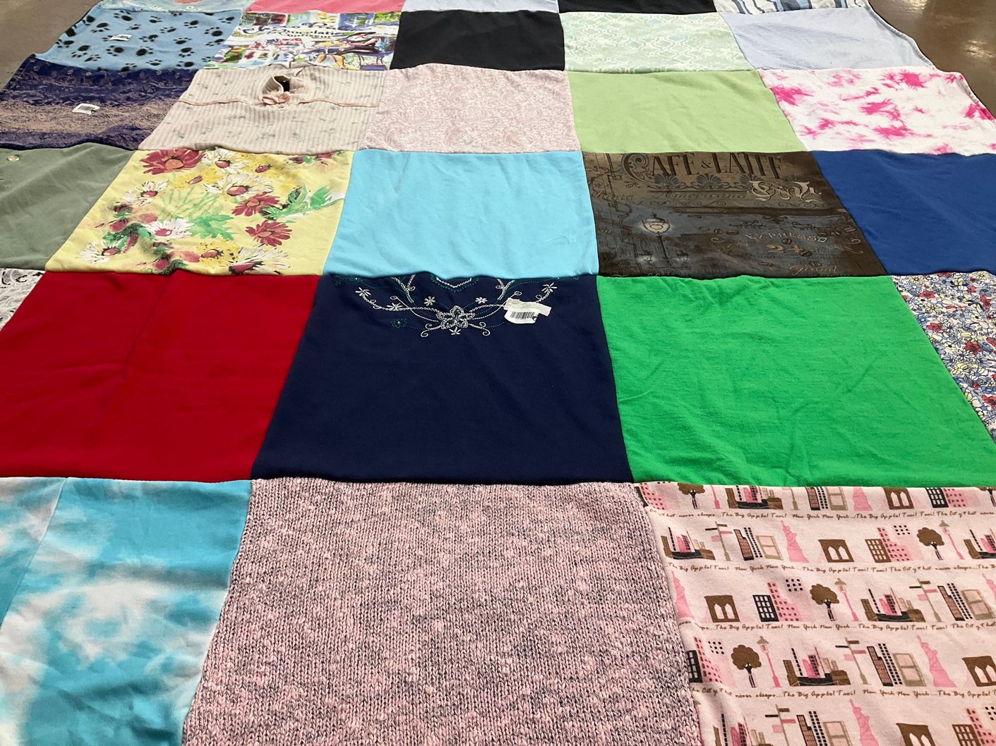T-shirt quilt with gardening, cooking themes by Annette from IA