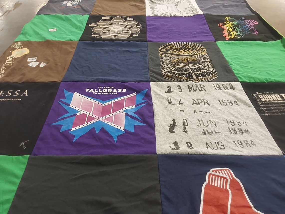 T-shirt quilt with film, music themes by Rachel from CA