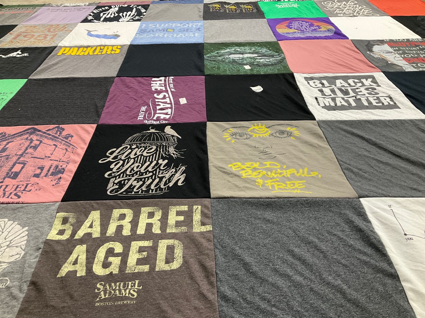 T-shirt quilt with social justice, equality themes by Sarah from CT