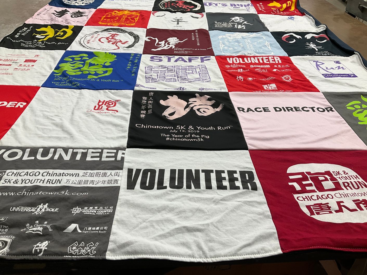 T-shirt quilt with running, community service themes by Anita from IL