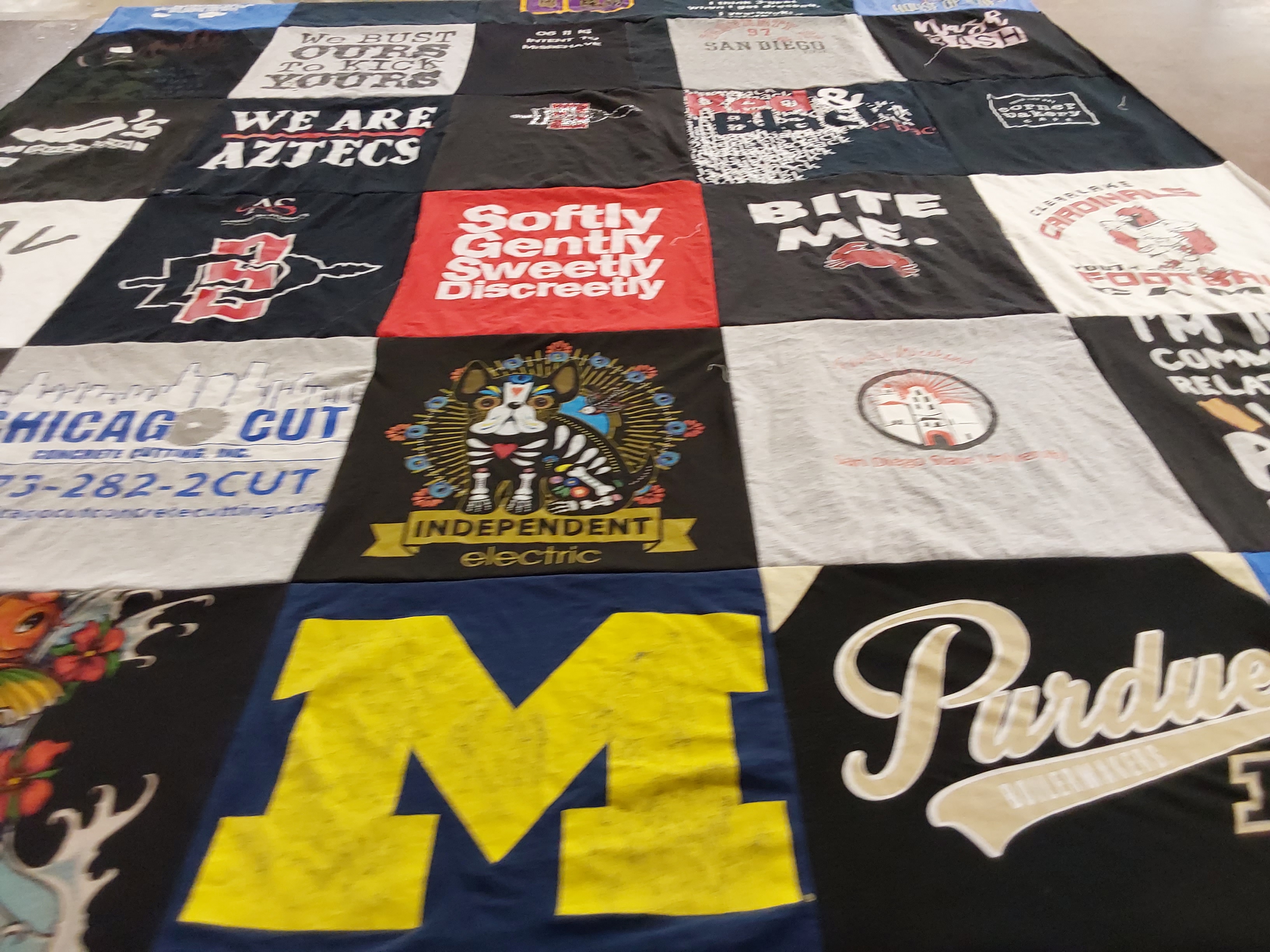 T-shirt quilt featuring san diego state university aztecs, northern arizona university cardinals by Bailey from CA