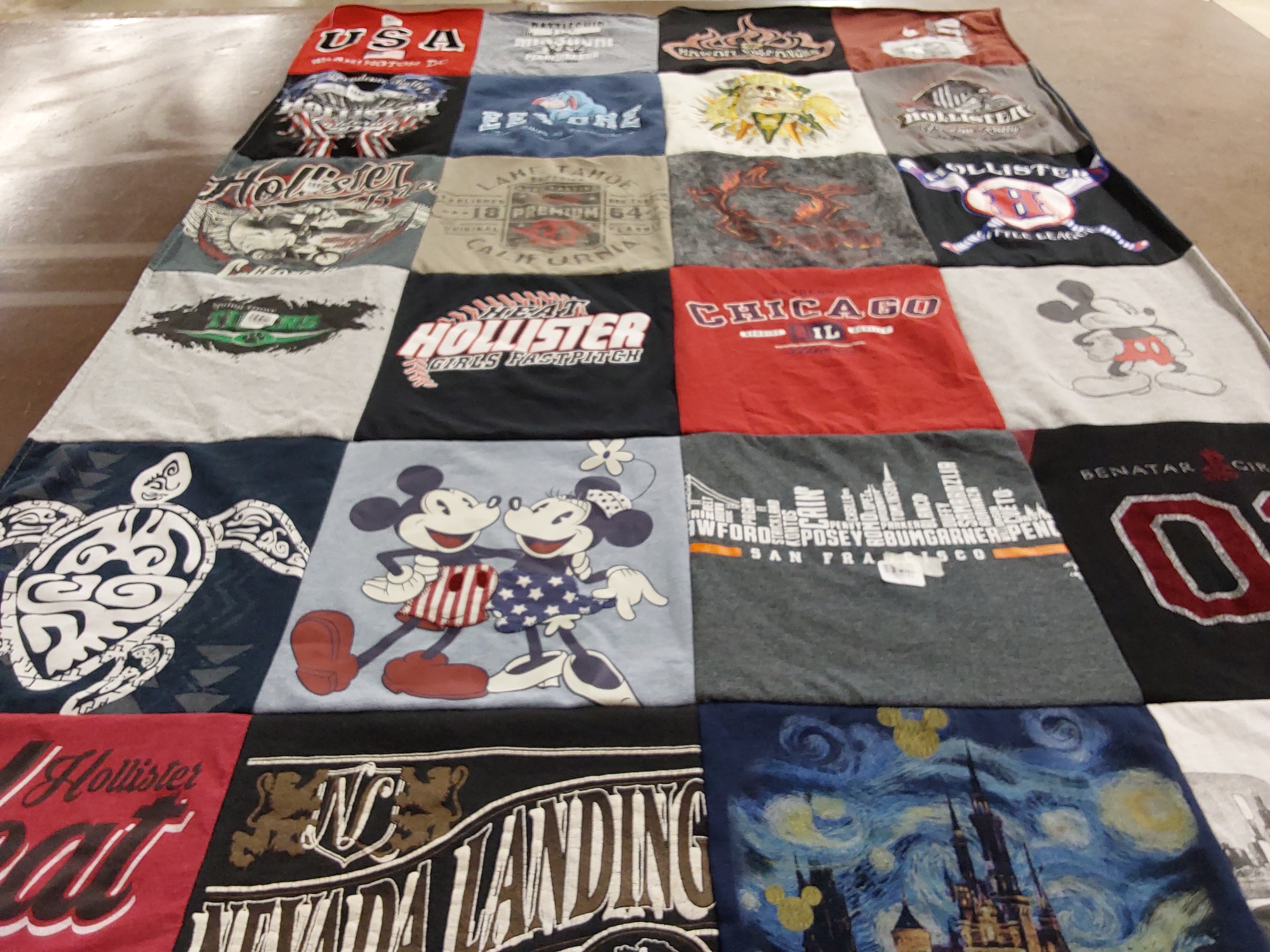 T-shirt quilt with travel, disney themes by Cammie from CA