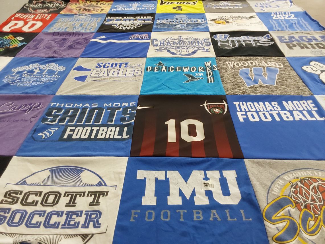 T-shirt quilt featuring scott eagles, thomas more saints football by Shari from KY