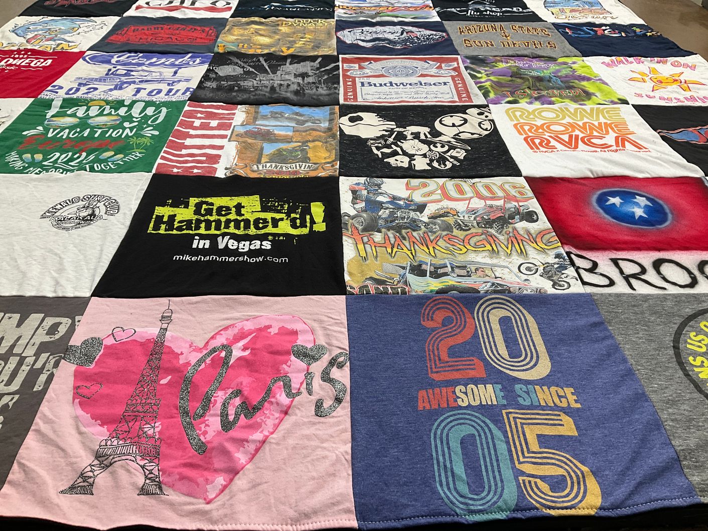 T-shirt quilt with travel, family themes by Kari from NV