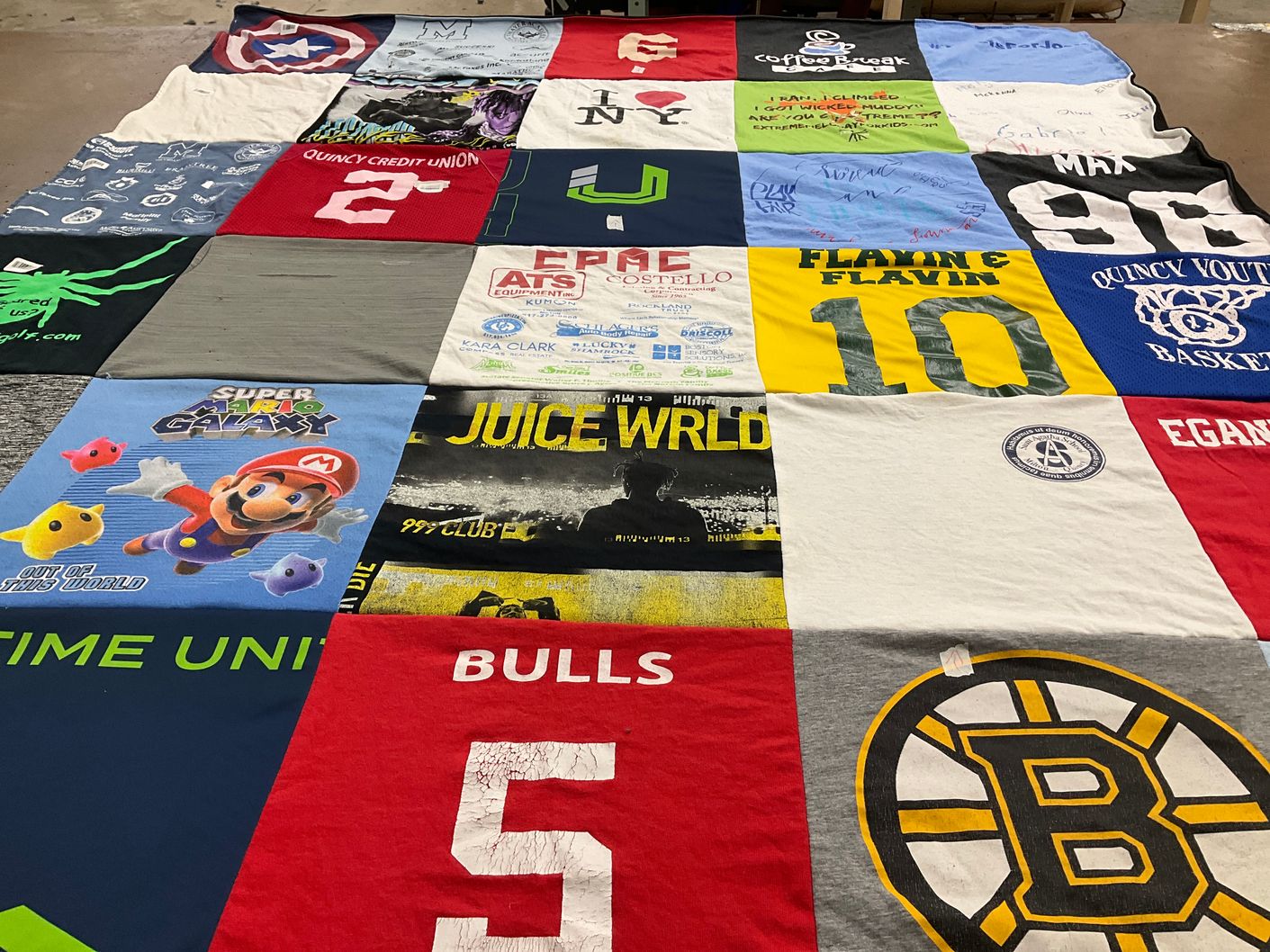 T-shirt quilt with gaming, basketball themes by Jennifer from MA