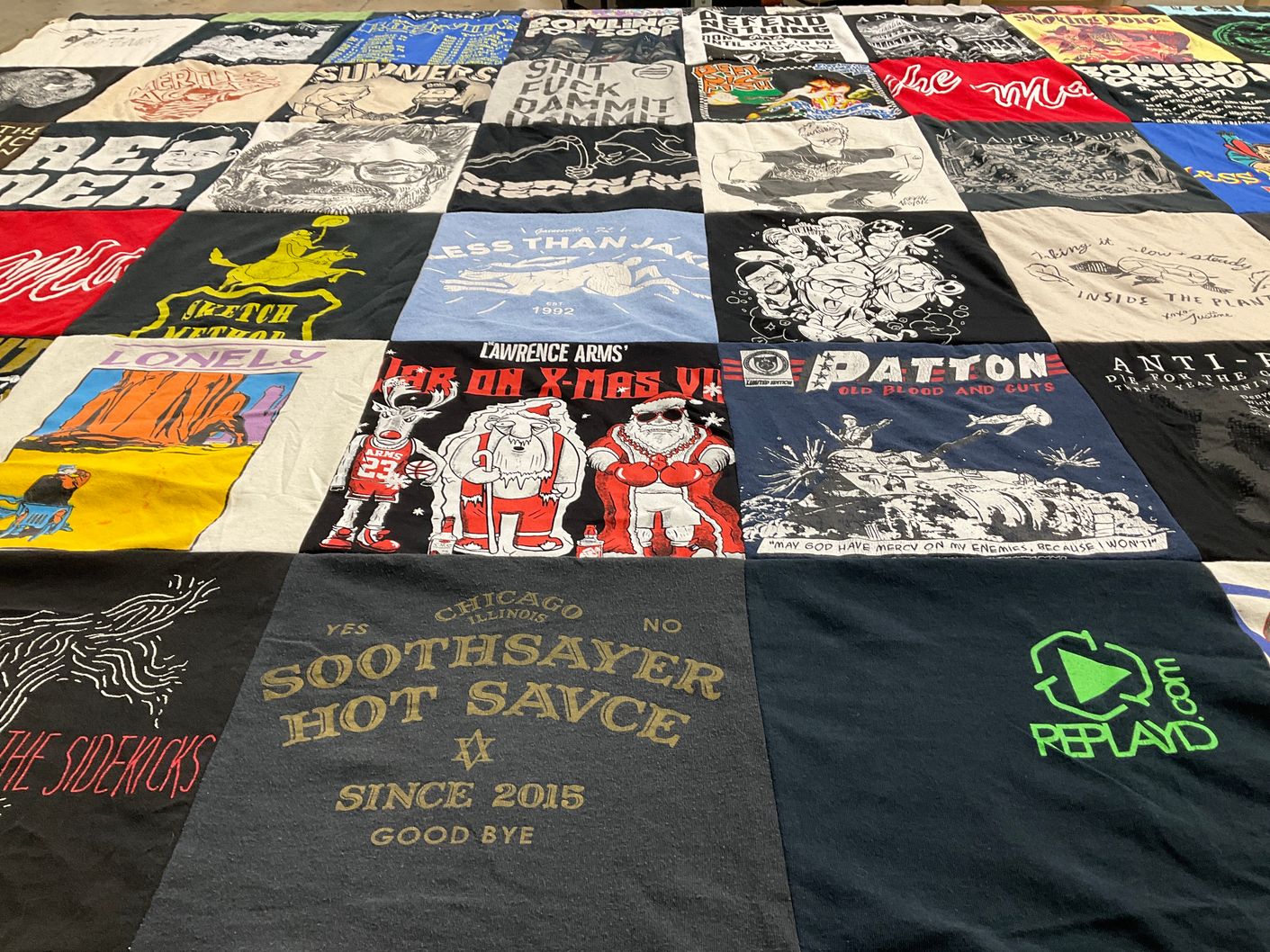 T-shirt quilt with punk, music themes by Catherine from IL