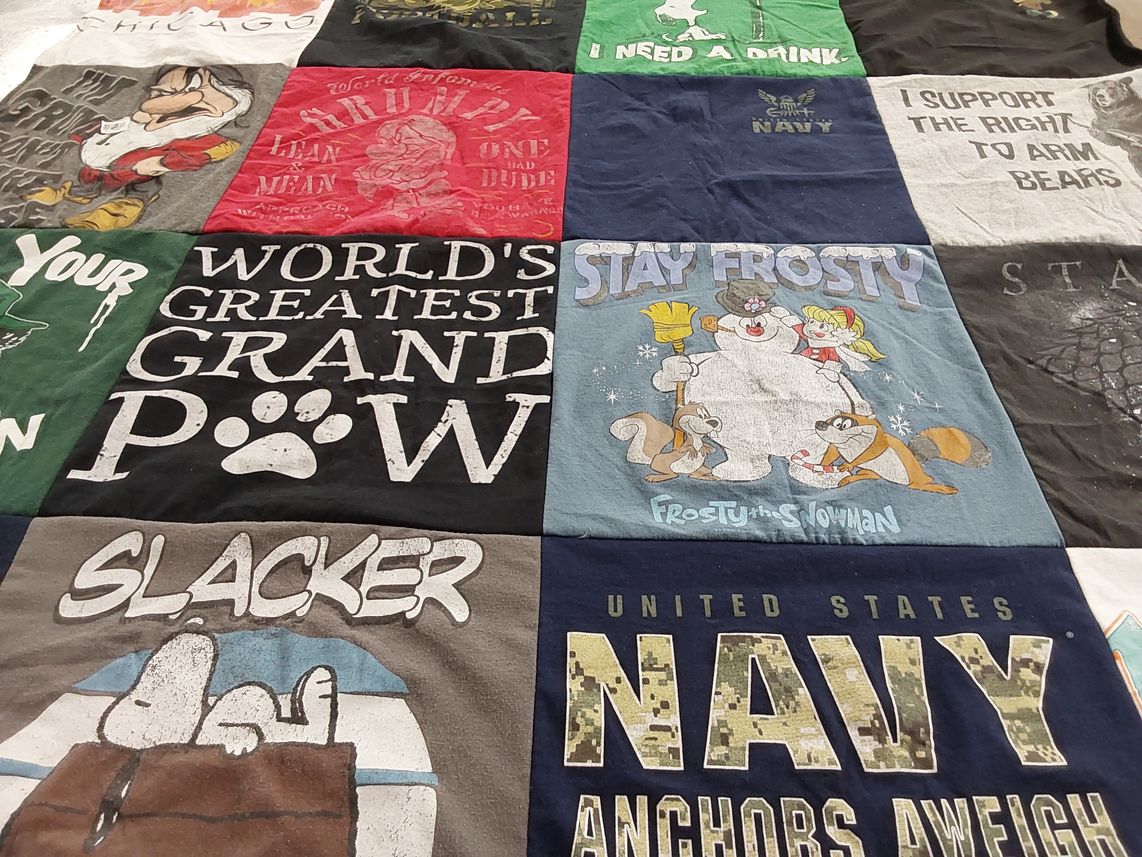 T-shirt quilt with comics, tv shows themes by Michaela from FL
