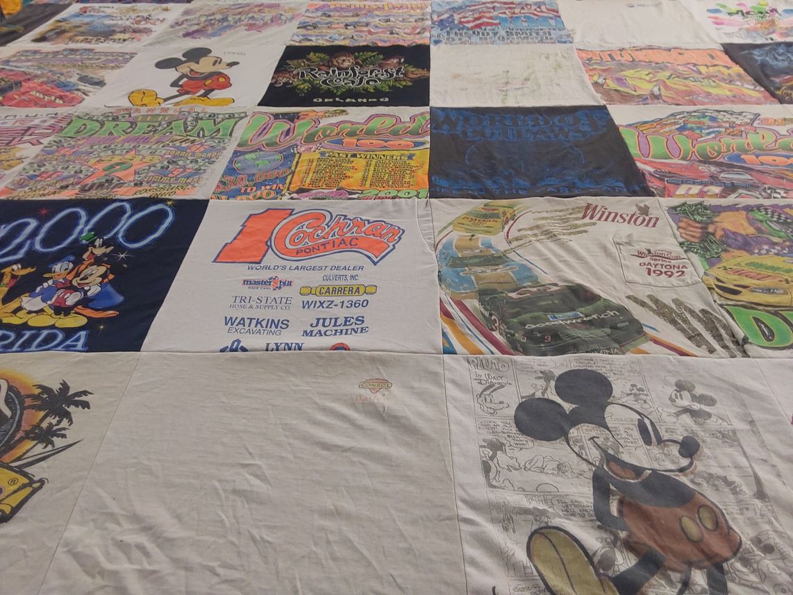 T-shirt quilt with disney, racing themes by Theresa from PA