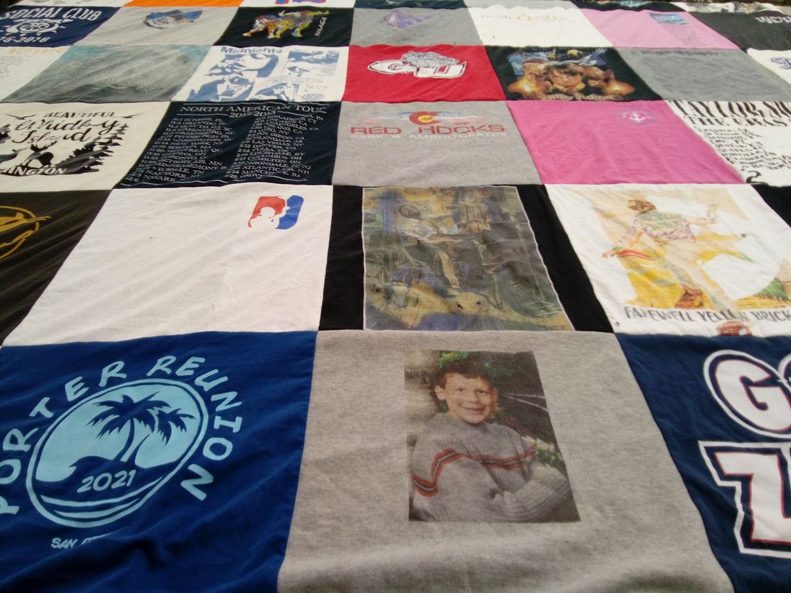 T-shirt quilt with family, travel themes by Catherine from WA