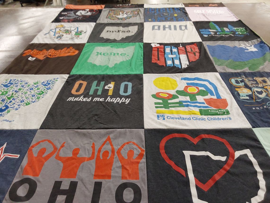 T-shirt quilt with ohio, healthcare themes by laura from AZ