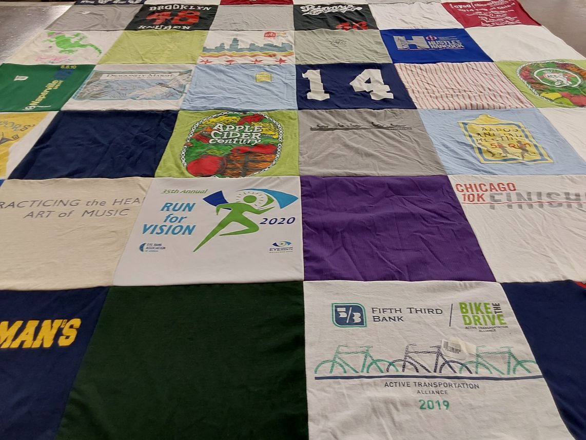 T-shirt quilt with running, music themes by Benjamin from IL