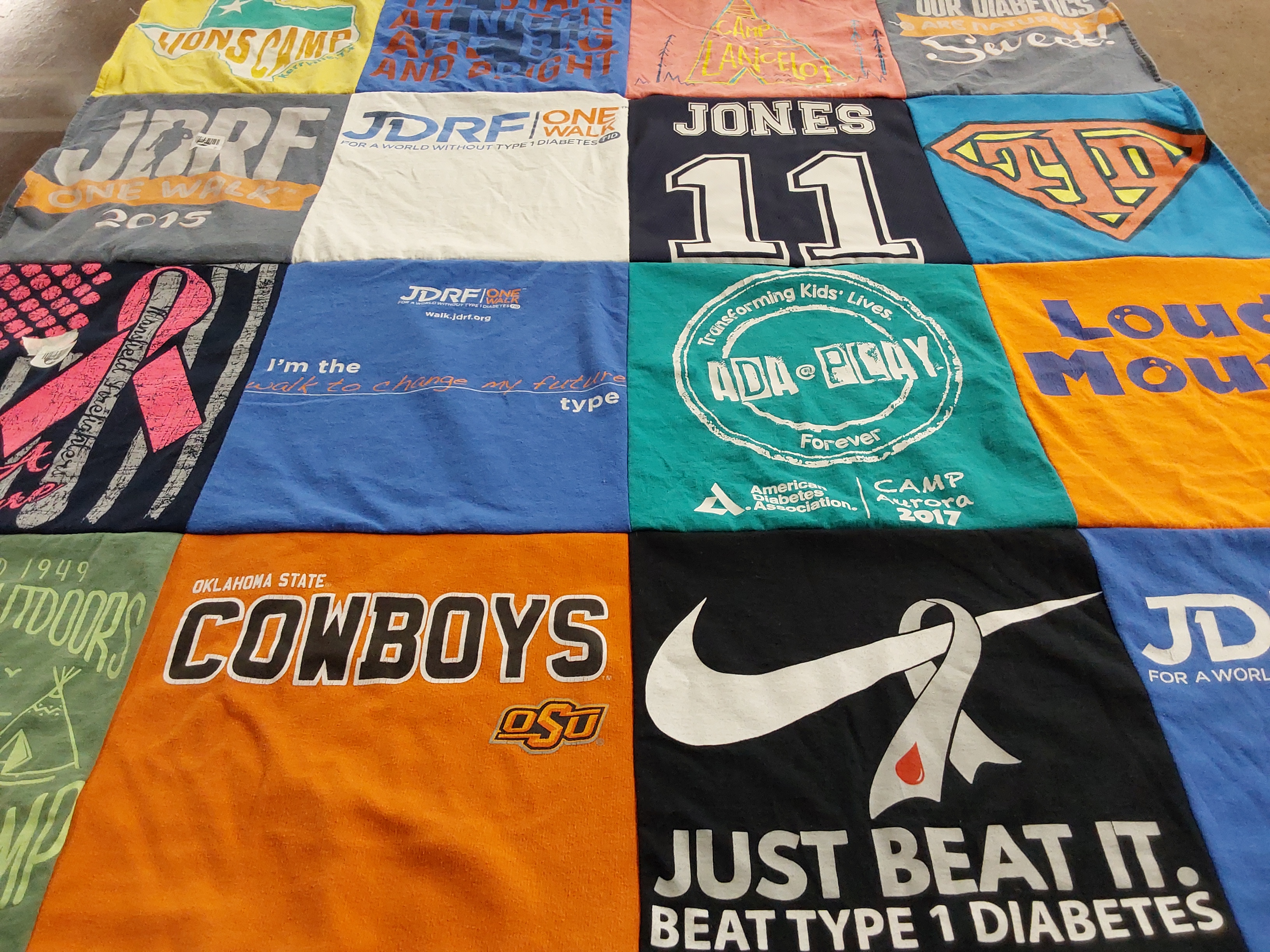 T-shirt quilt featuring oklahoma state university cowboys by Shelley from TX