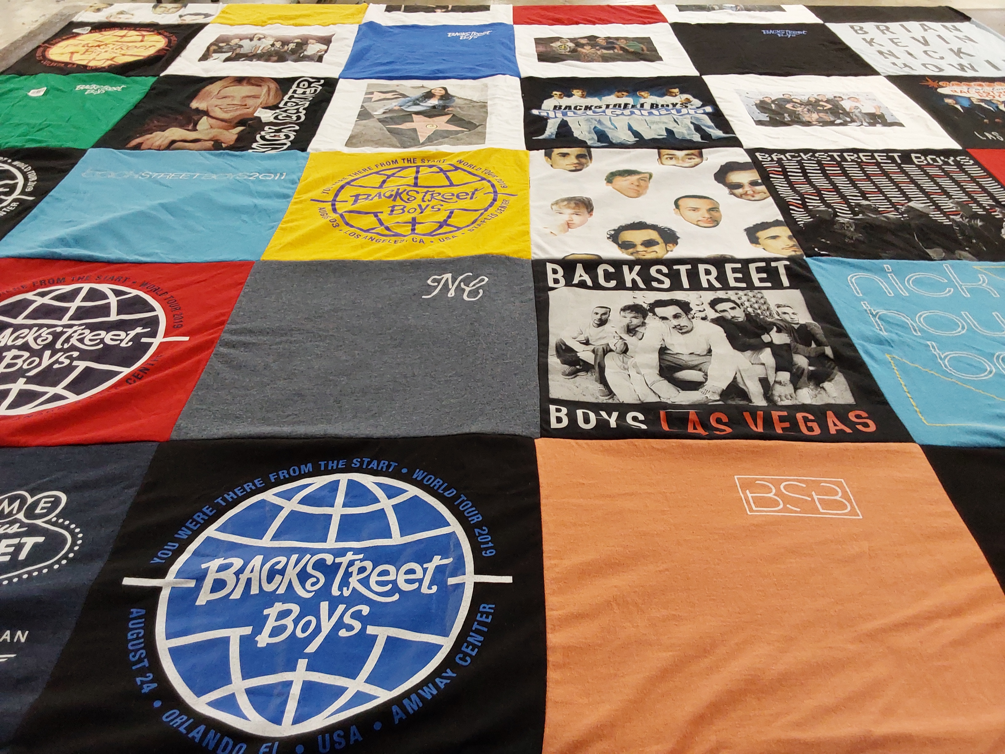 T-shirt quilt with music, pop culture themes by Arlene from CA