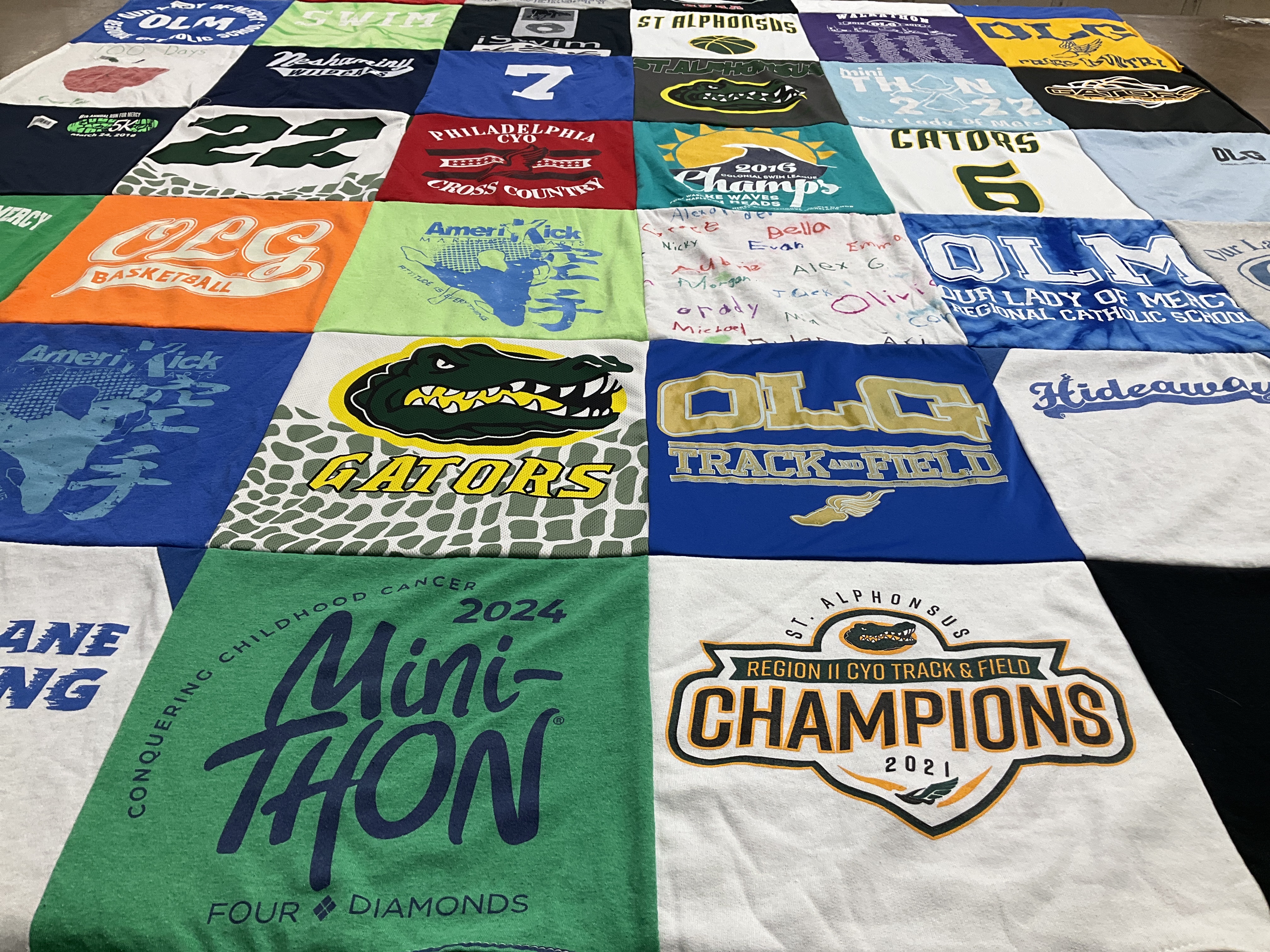 T-shirt quilt featuring olg track and field, gators basketball by Nancy from PA
