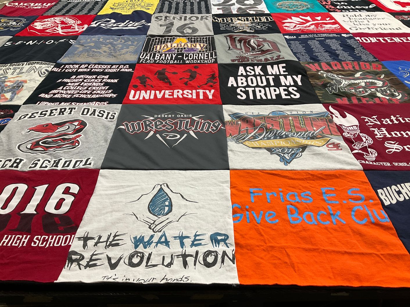 T-shirt quilt featuring desert oasis wrestling by Christian from NV