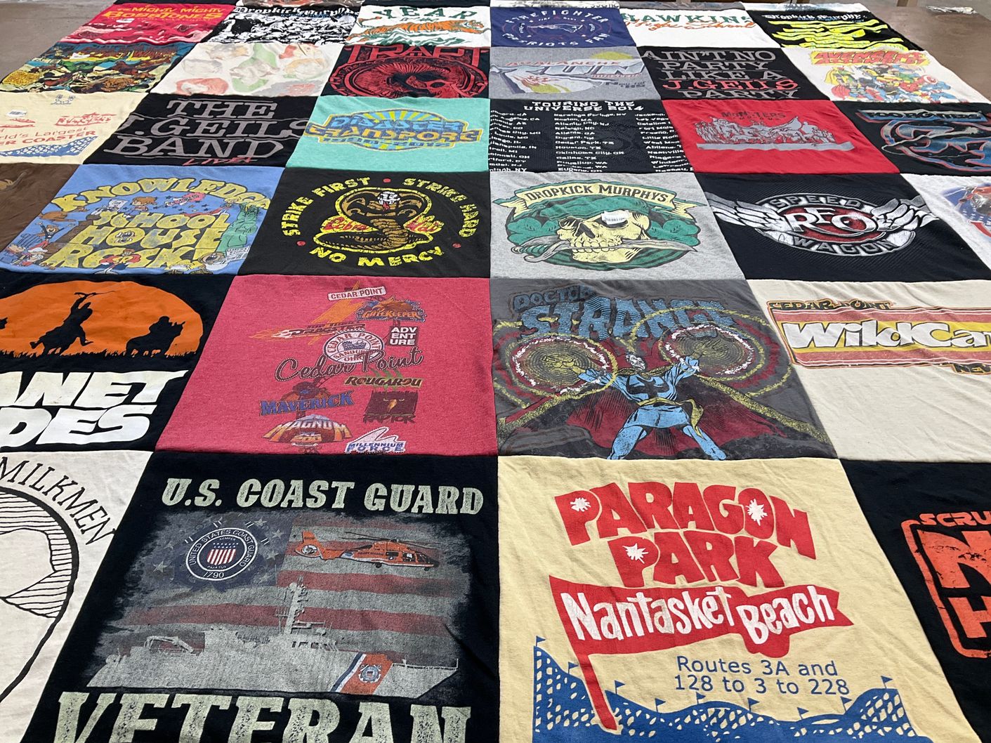 T-shirt quilt with music, comics themes by Allison from MA