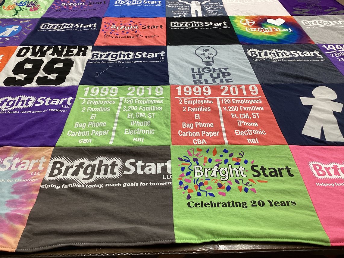 T-shirt quilt with community support, family assistance themes by Elizabeth from SC