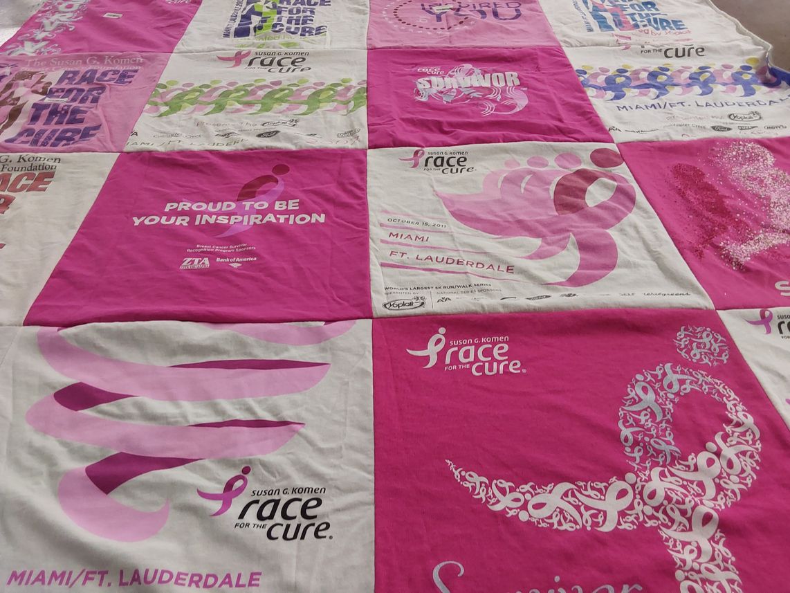 T-shirt quilt with breast cancer awareness, charity events themes by Jennifer from NC