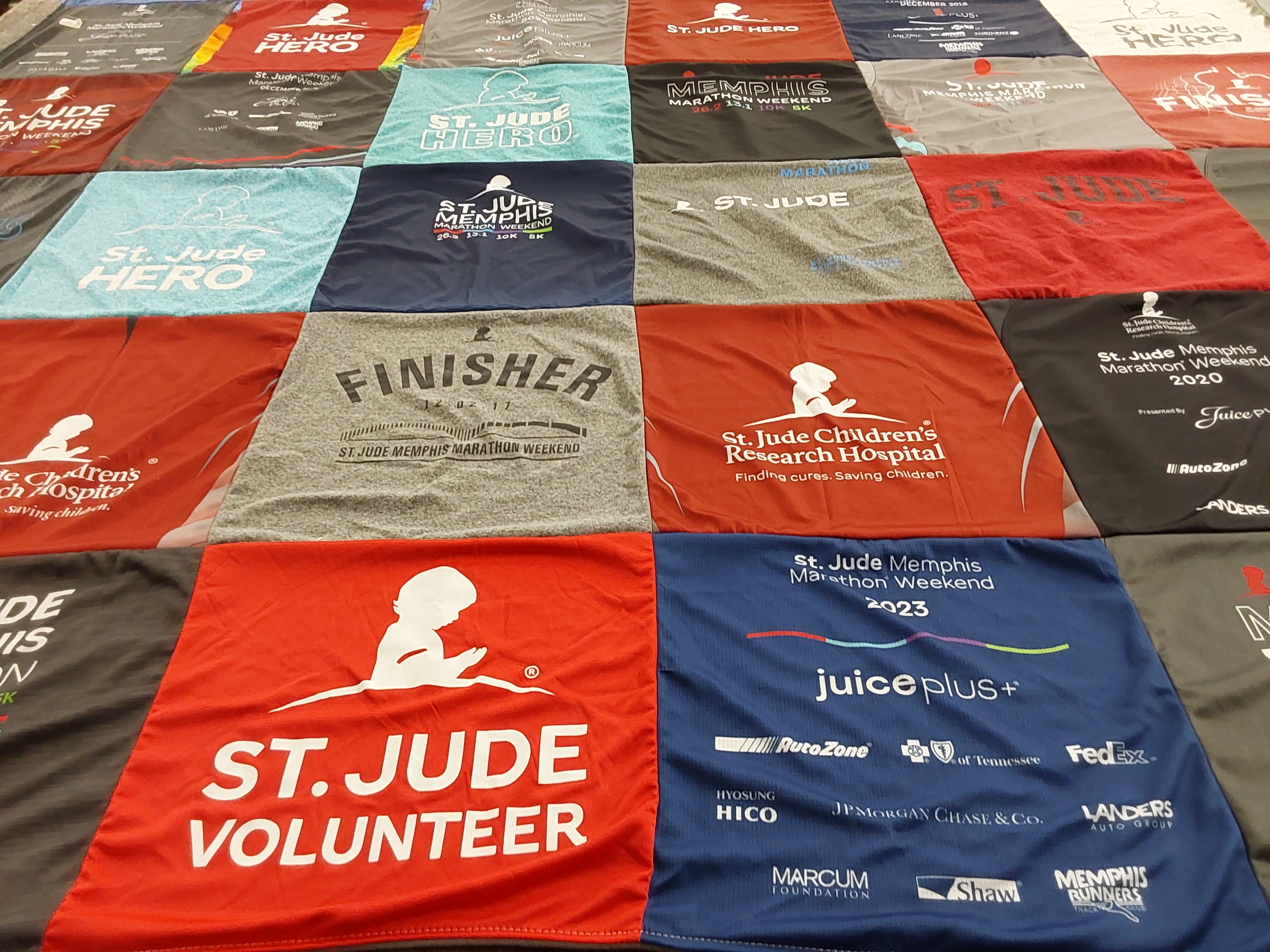 T-shirt quilt with running, volunteering themes by Havilah from WV