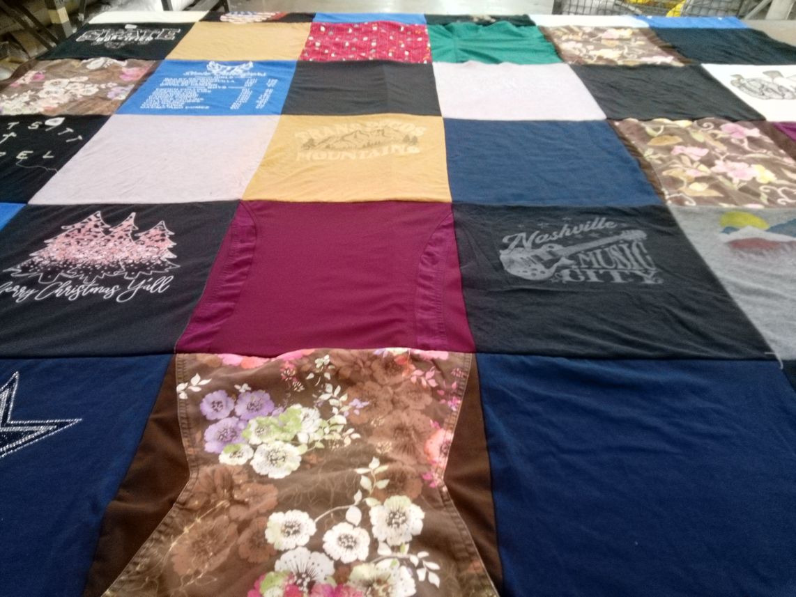 T-shirt quilt with music, festivals themes by Thea from KS