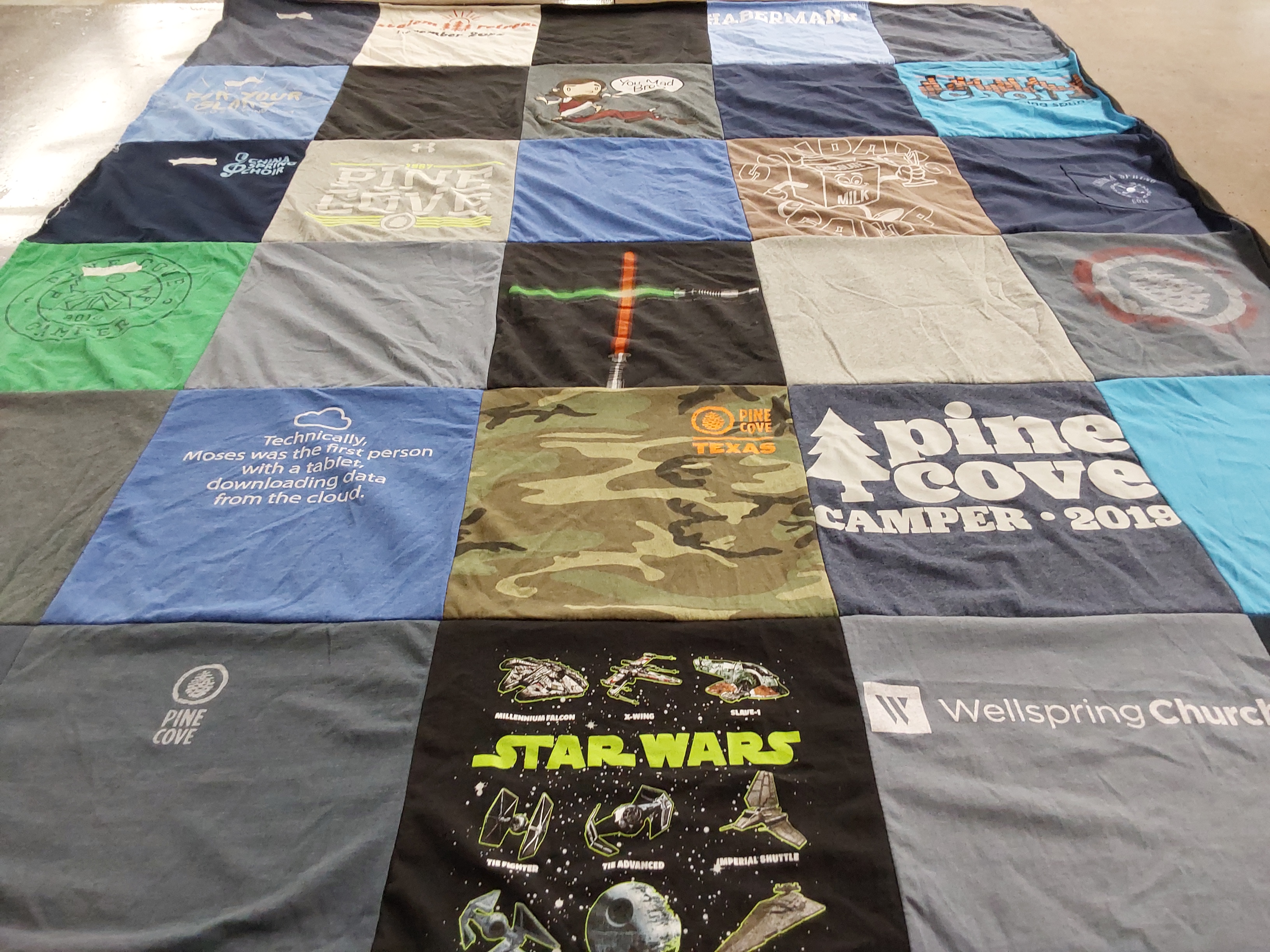 T-shirt quilt with camping, technology themes by Stephanie from TX