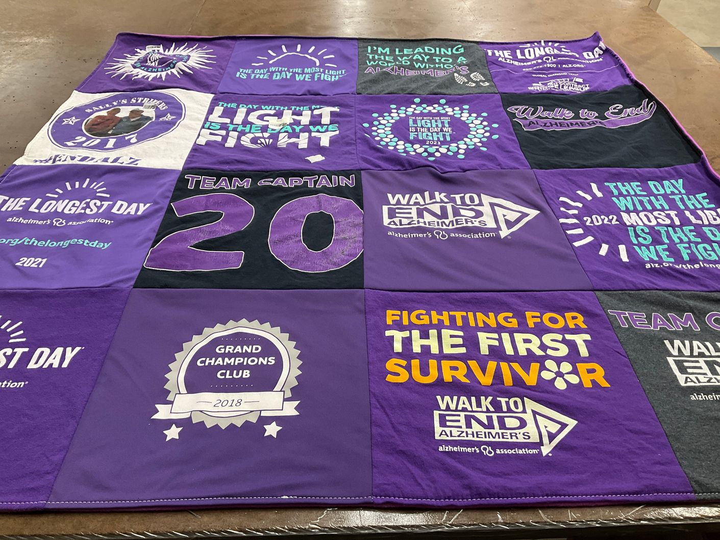 T-shirt quilt with alzheimer awareness, charity events themes by Jennifer from MA
