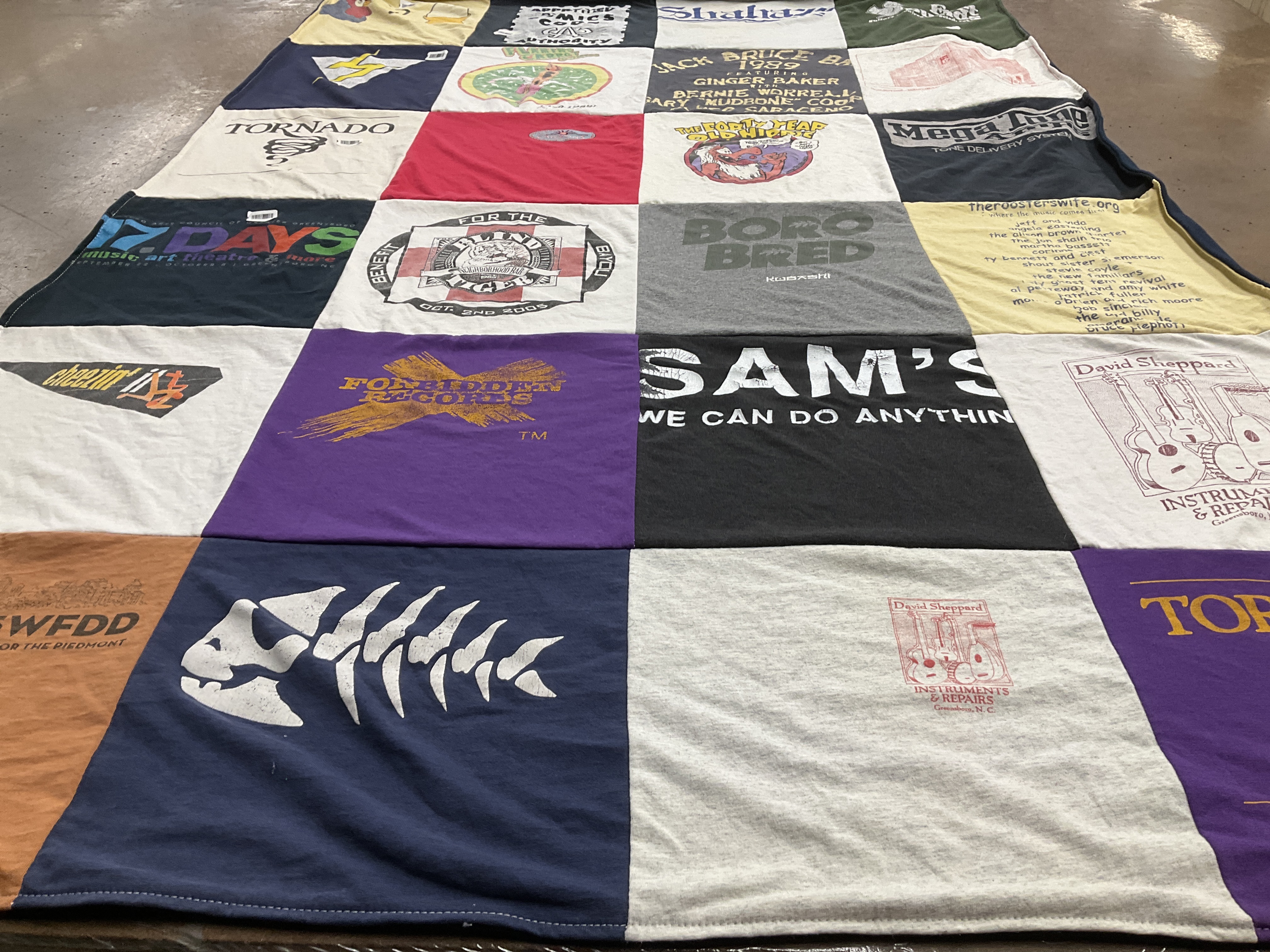 T-shirt quilt with music, art themes by Sam from NC