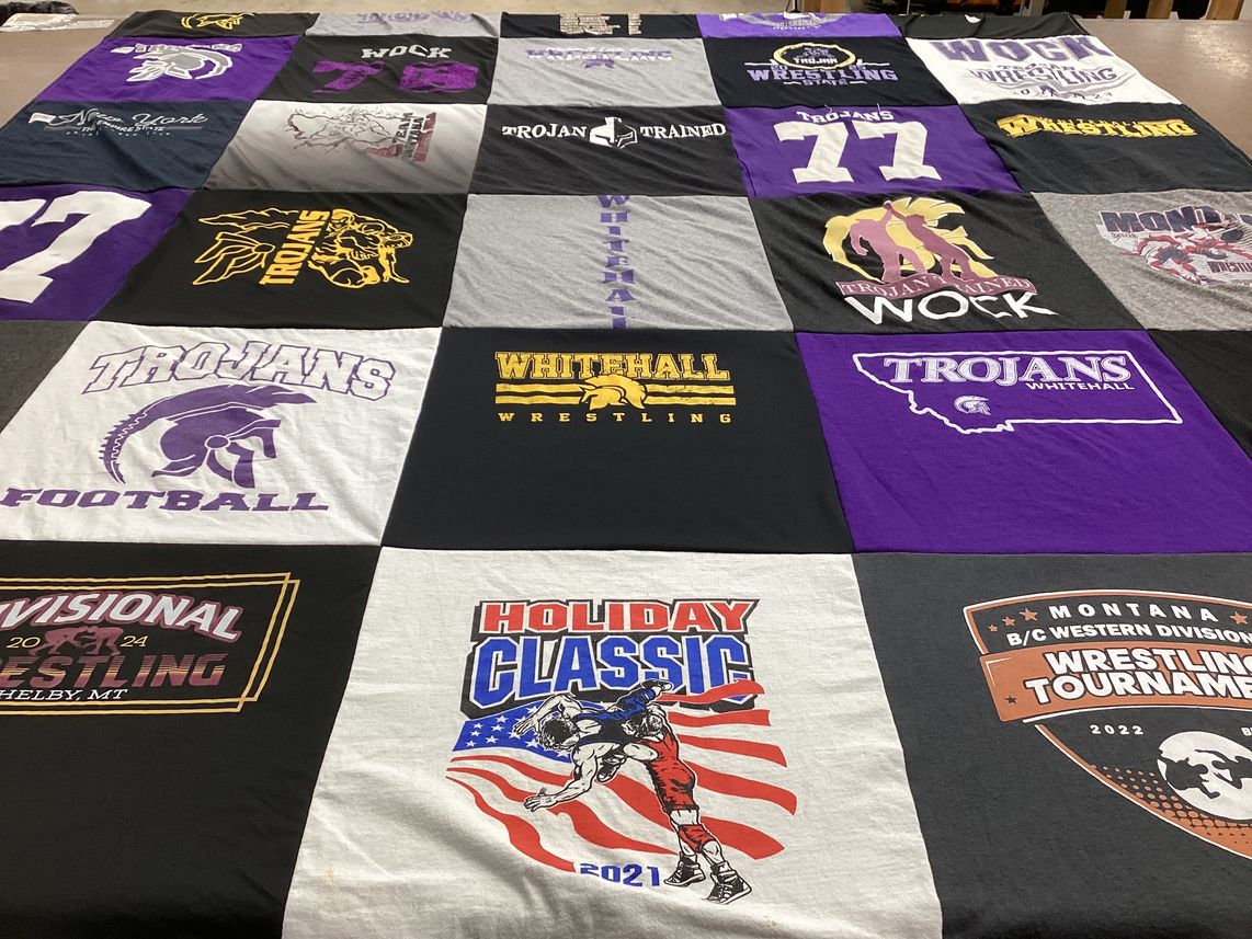 T-shirt quilt featuring whitfall trojans by Jari from MT