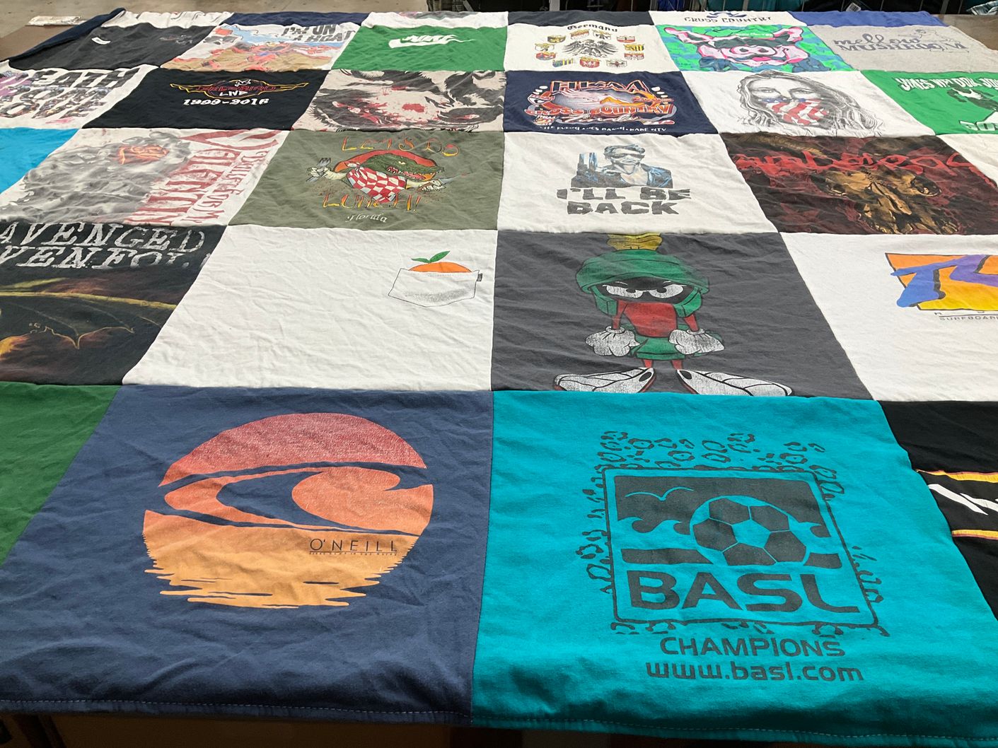 T-shirt quilt with sports, entertainment themes by Marvin from FL