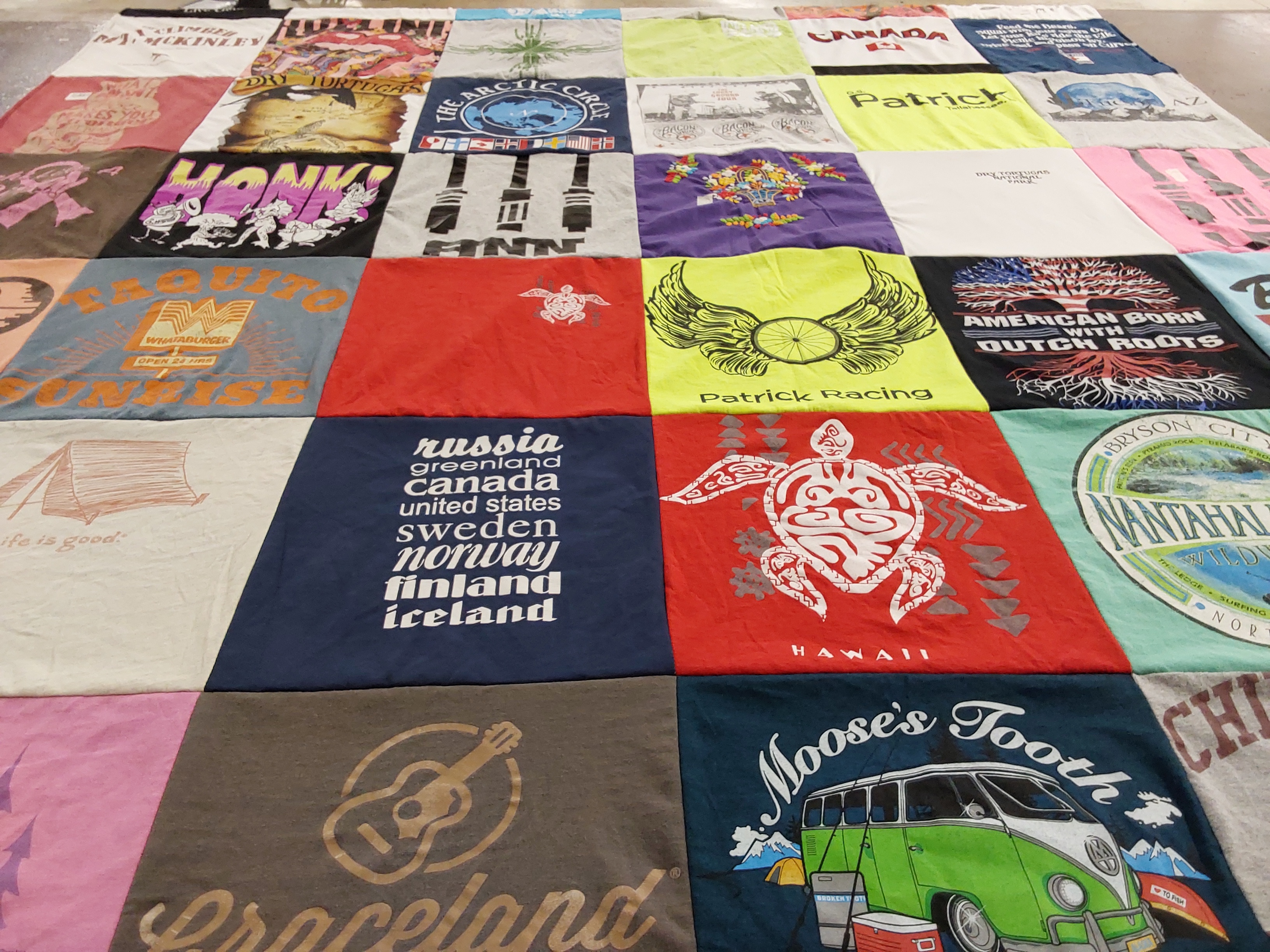 T-shirt quilt with travel, music themes by Jim from FL