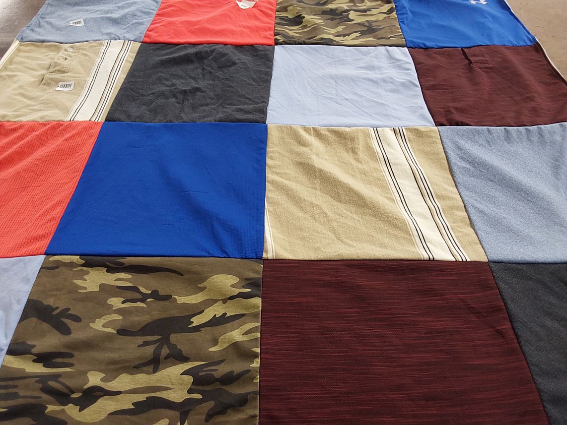 T-shirt quilt with sports, fashion themes by Teresa from VA