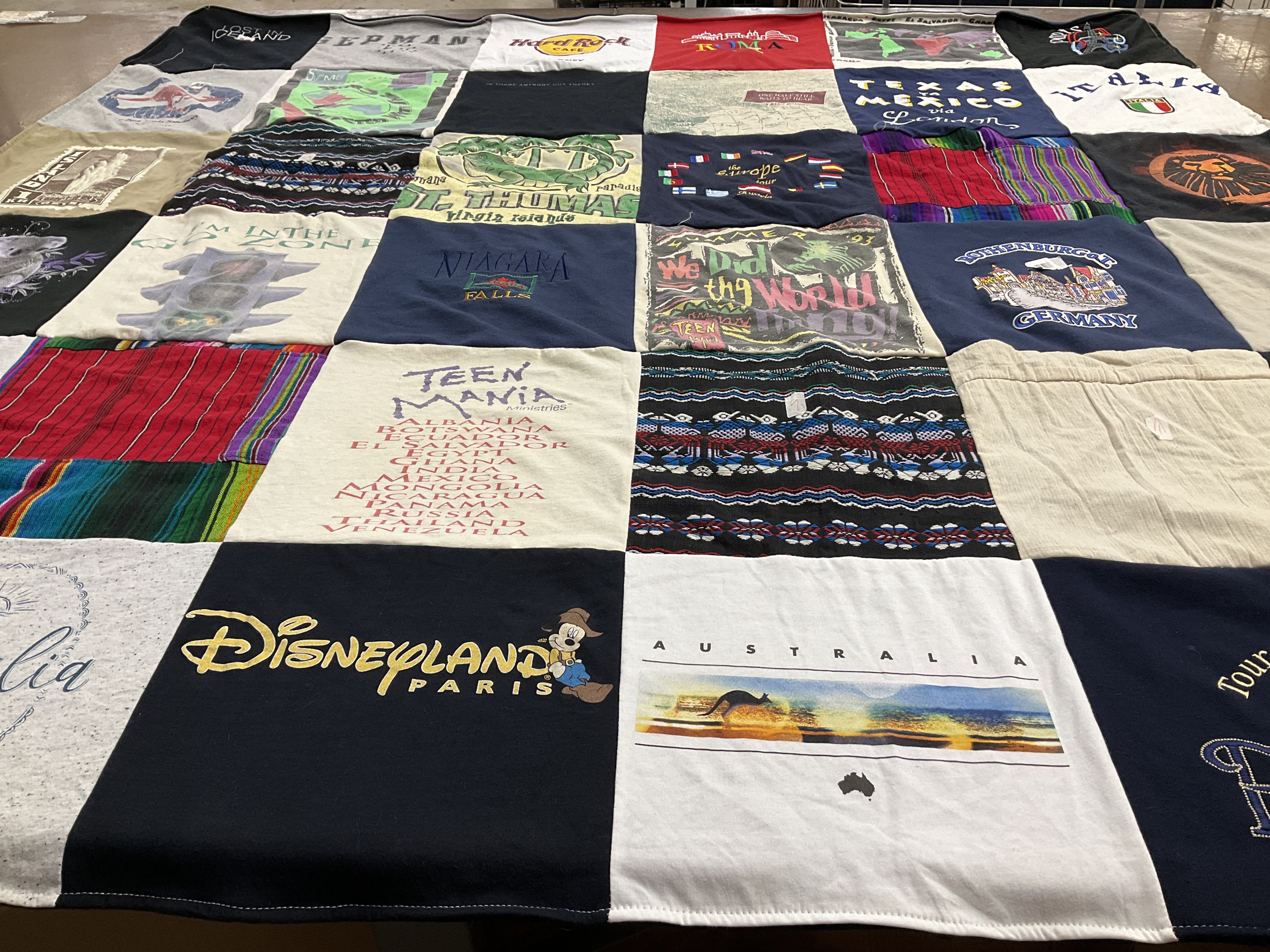 T-shirt quilt with travel, culture themes by Rachel from MD