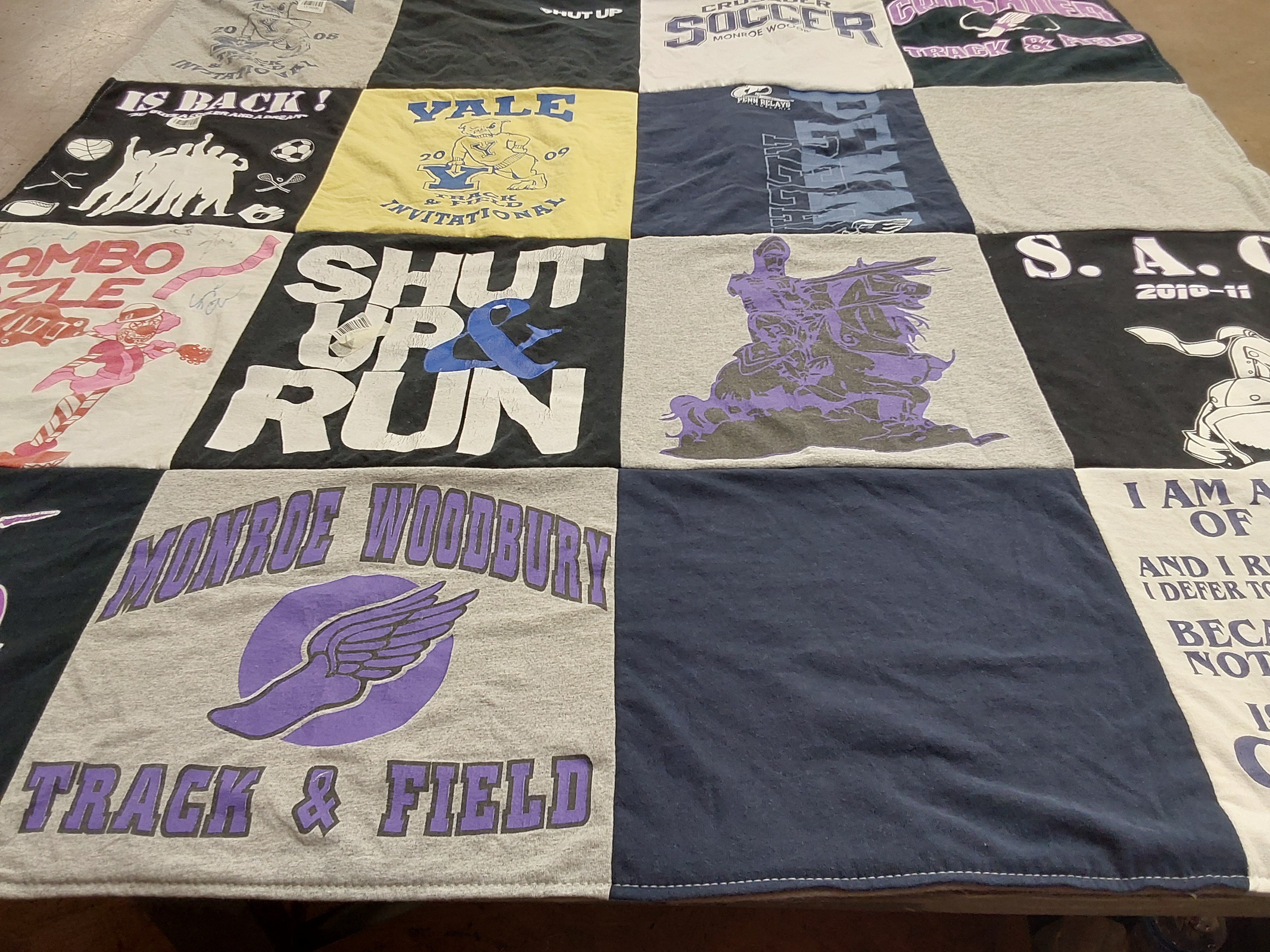 T-shirt quilt featuring monroe woodbury track and field, monroe woodbury soccer by Courtney from NY