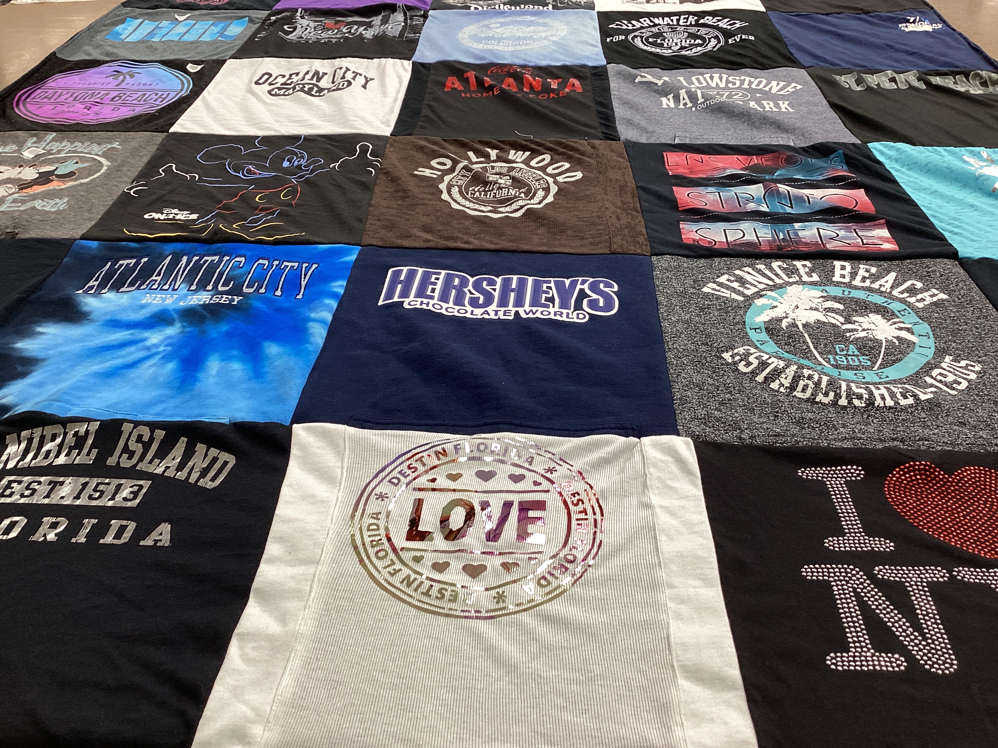 T-shirt quilt with travel, theme parks themes by Sheryl from KS