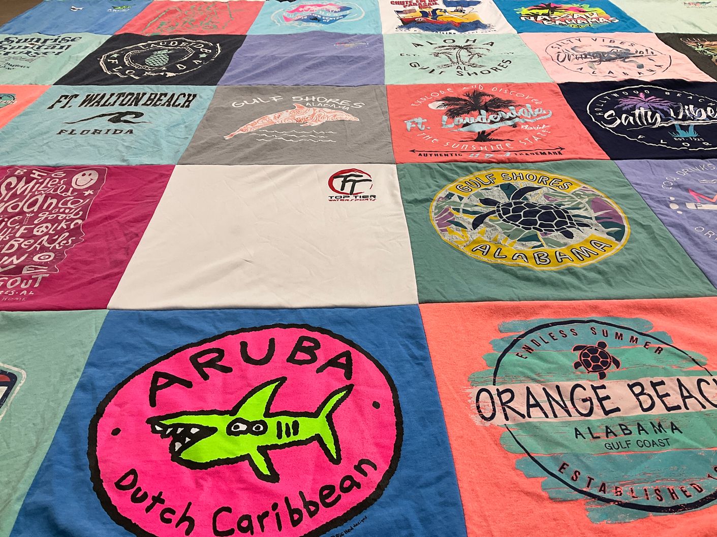 T-shirt quilt with beach, travel themes by Holly from TN