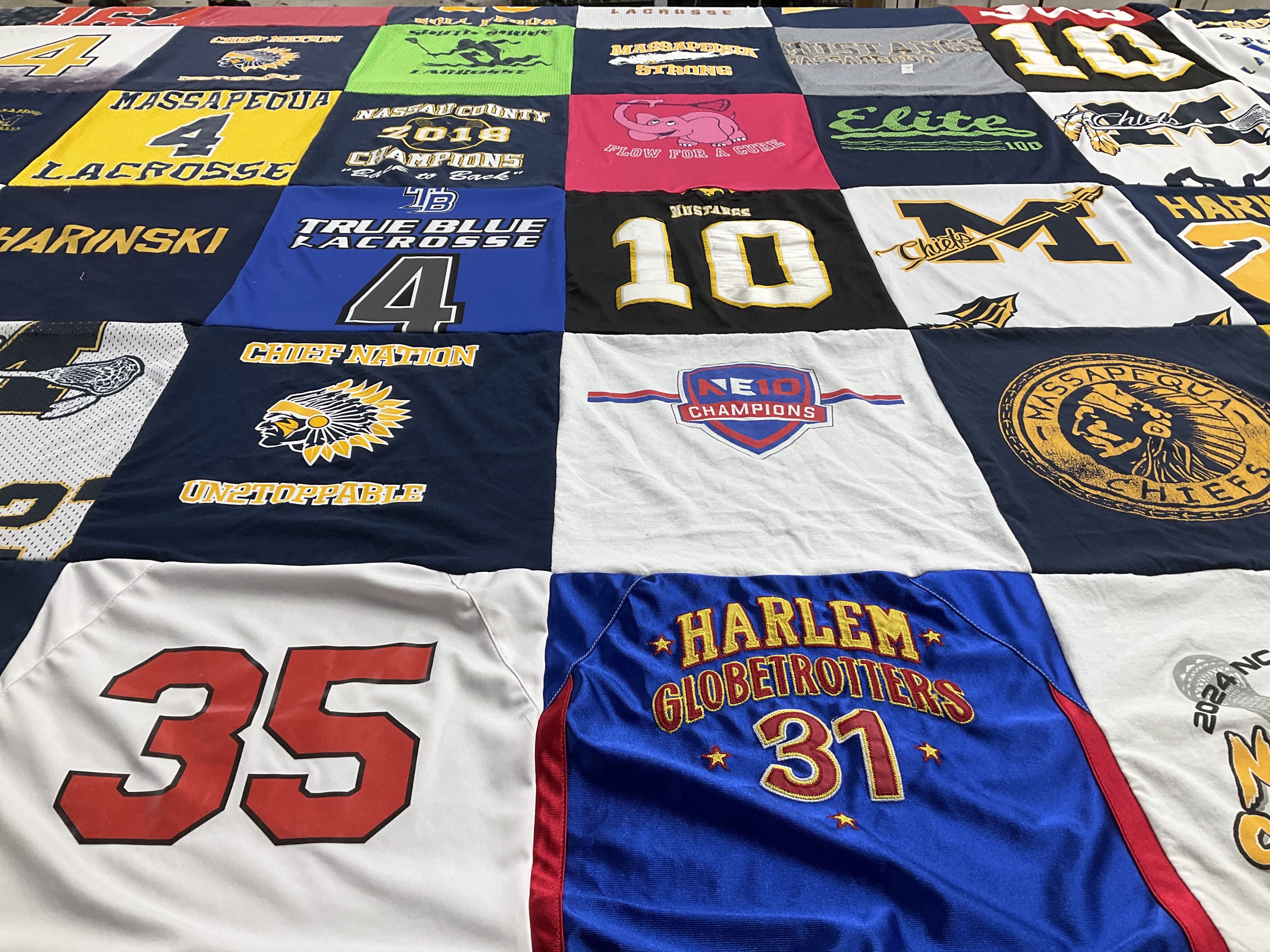T-shirt quilt featuring massapequa chiefs, harlem globetrotters by kathleen from NY