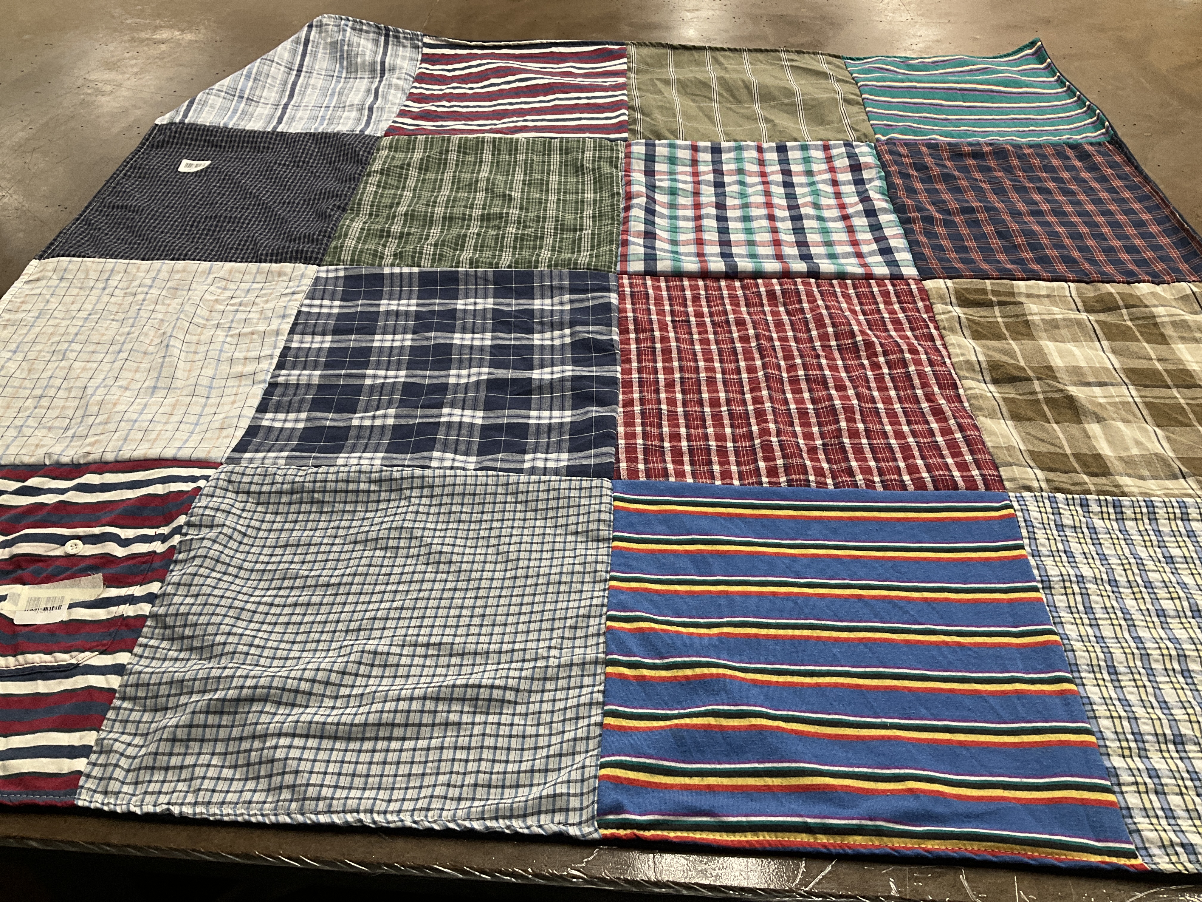 T-shirt quilt with textiles, crafting themes by Kristin from NY
