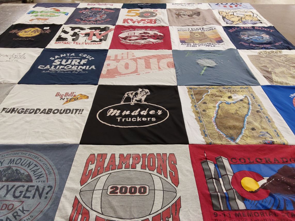 T-shirt quilt with surfing, television themes by Laura from CO