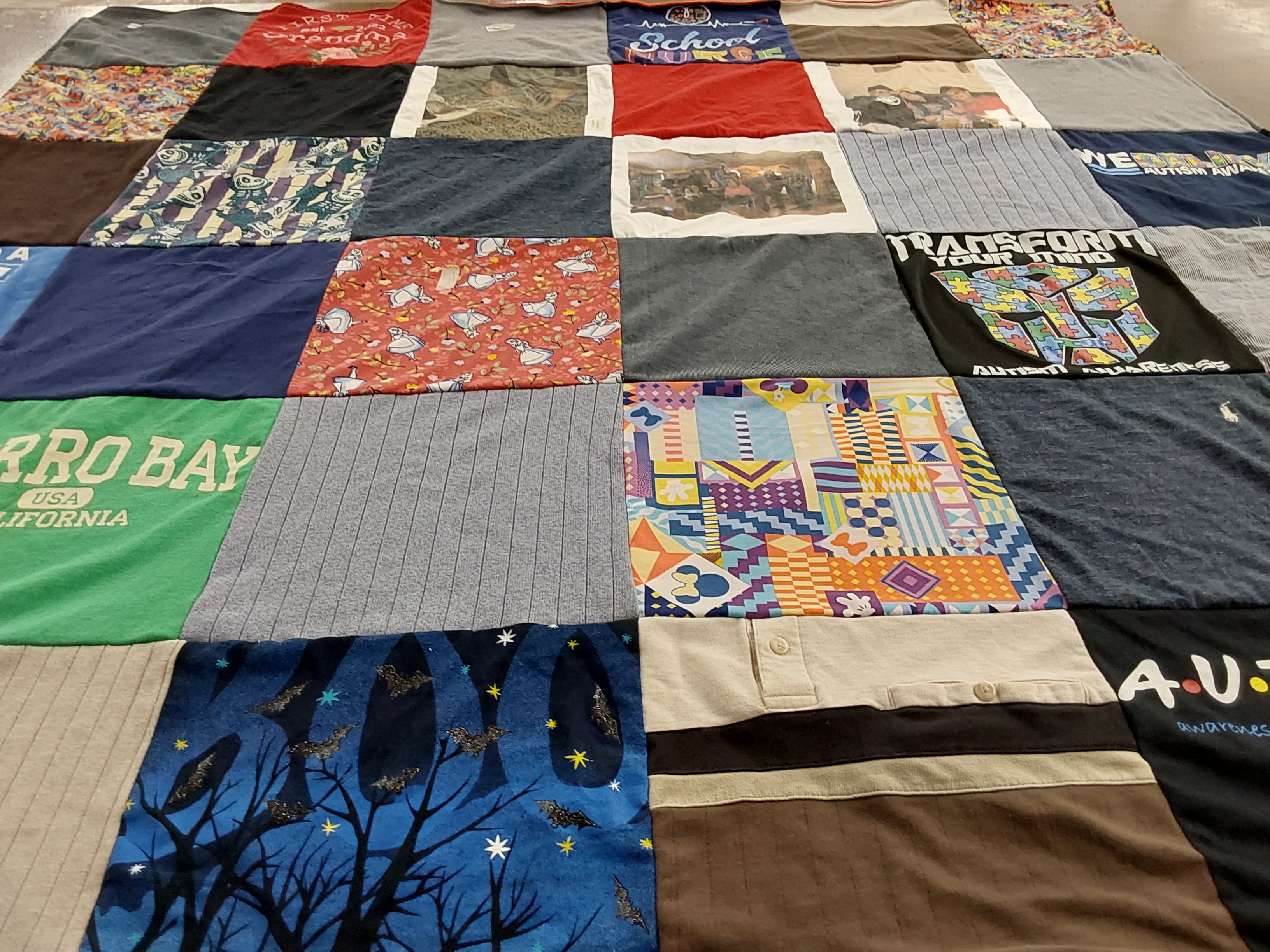 T-shirt quilt with autism awareness themes by Pam from CA