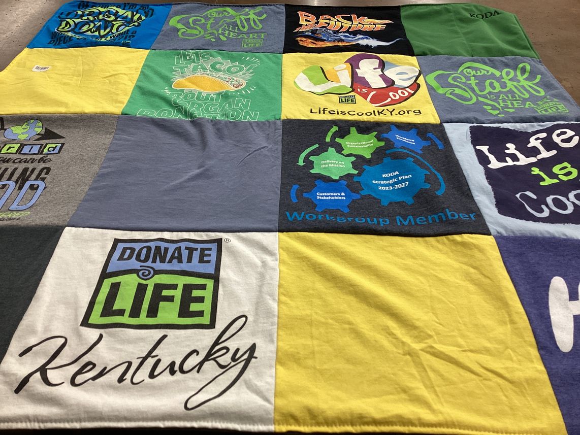 T-shirt quilt with donation, community themes by Julie from KY