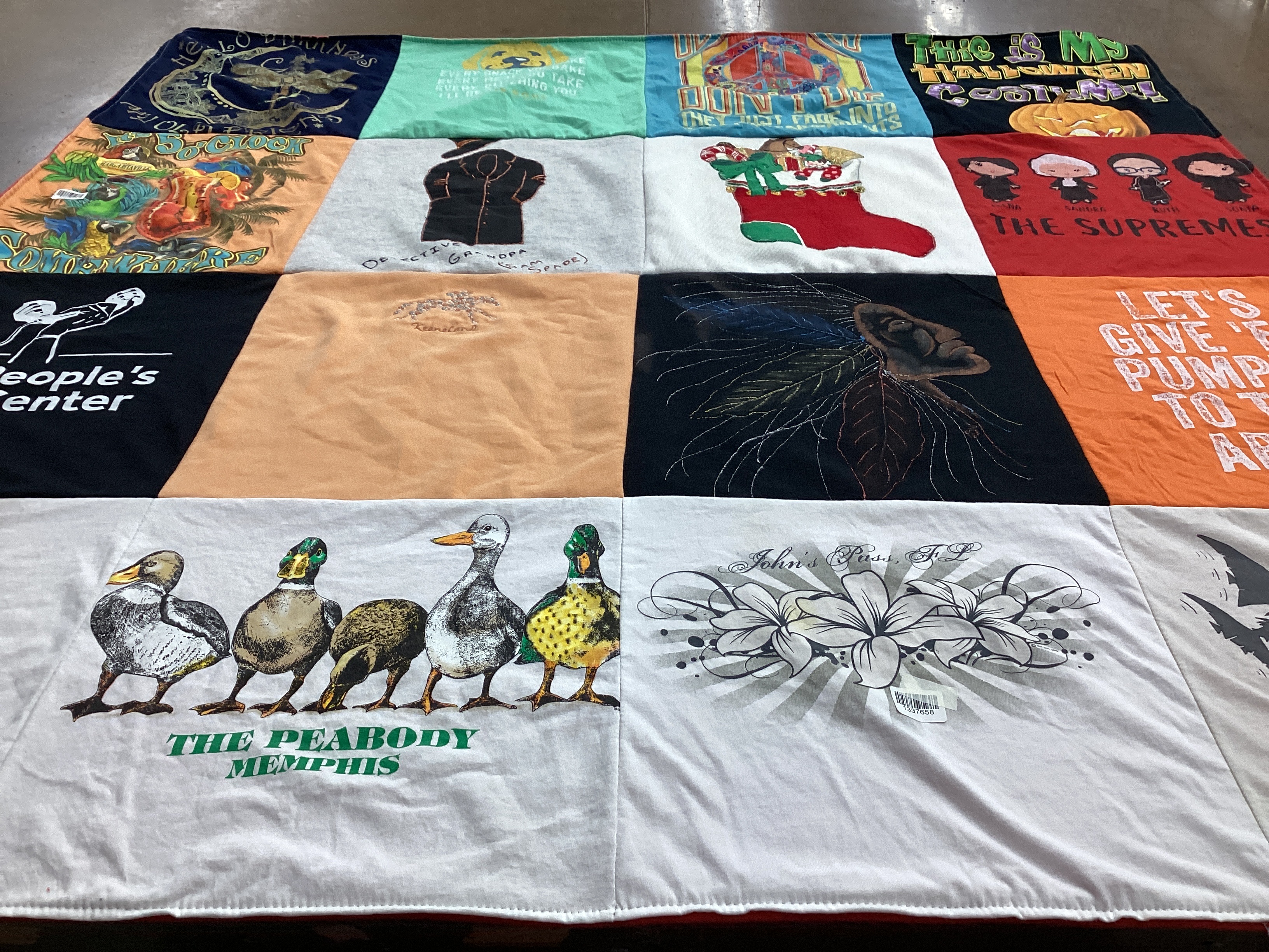 T-shirt quilt with wildlife, community service themes by Jennifer from KY