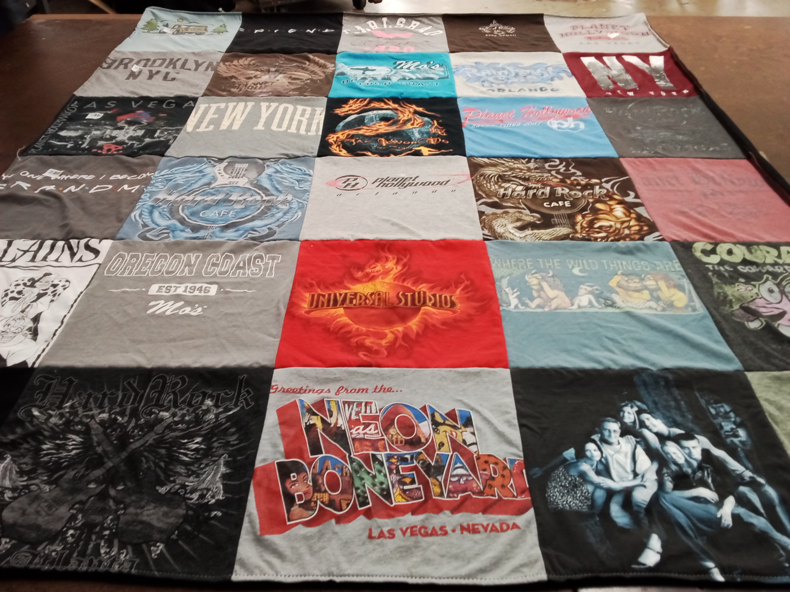 T-shirt quilt with travel, cities themes by Teresa from ID