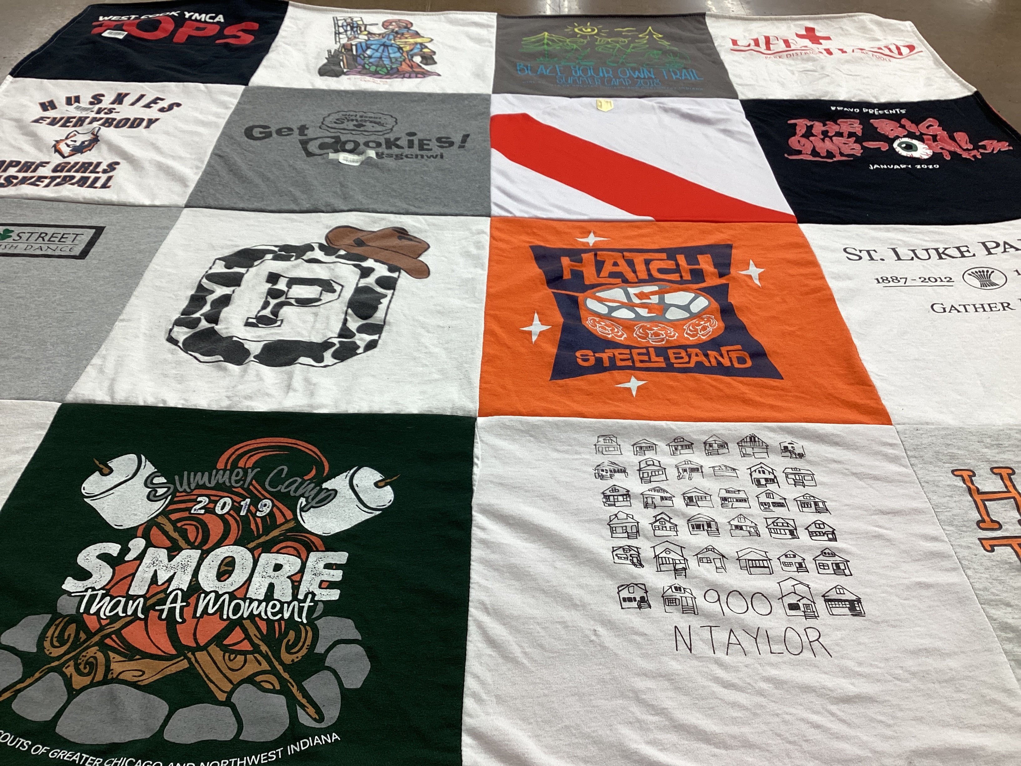 T-shirt quilt with camping, cooking themes by Allison from IL